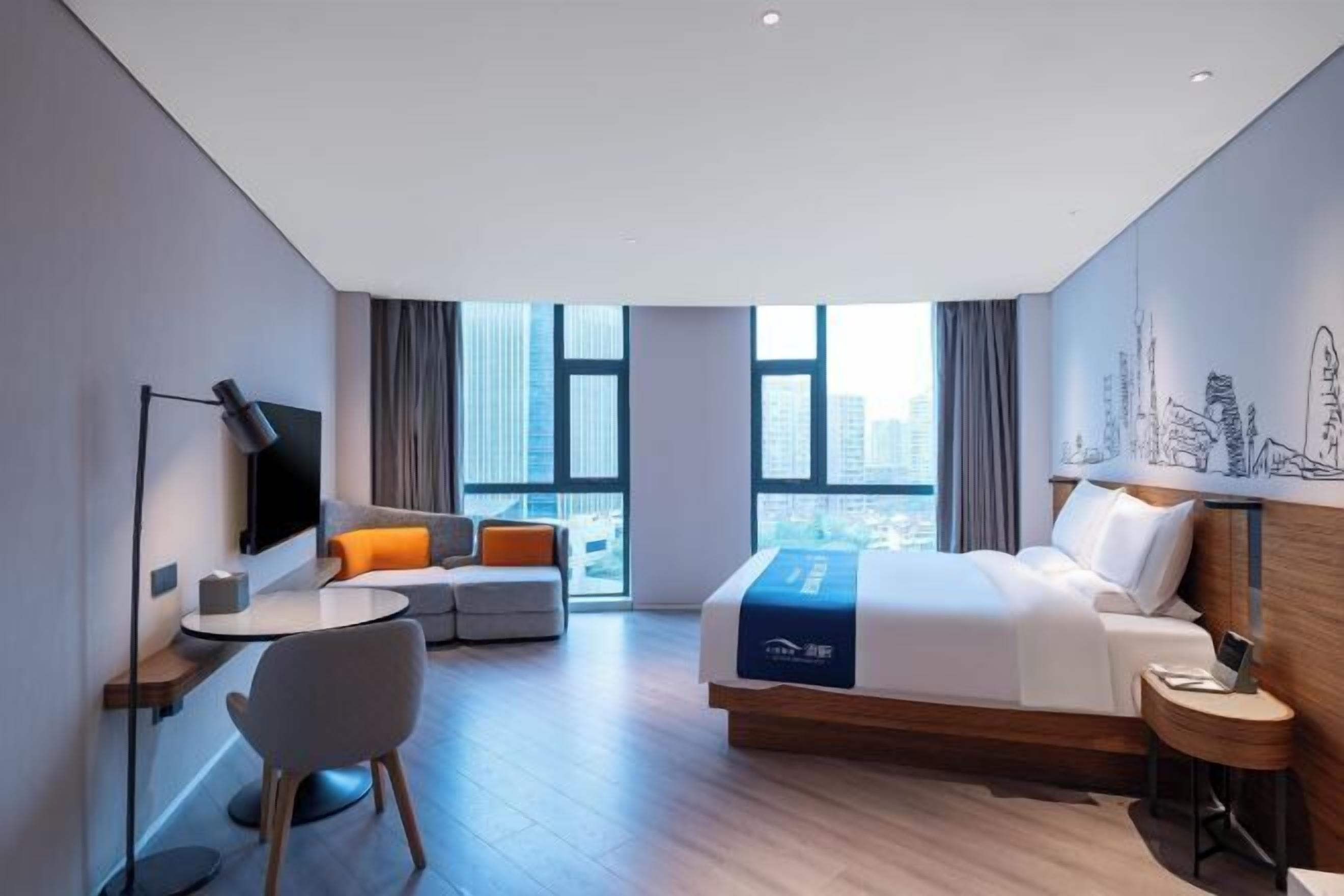 Down comforters, free minibar, in-room safe, desk