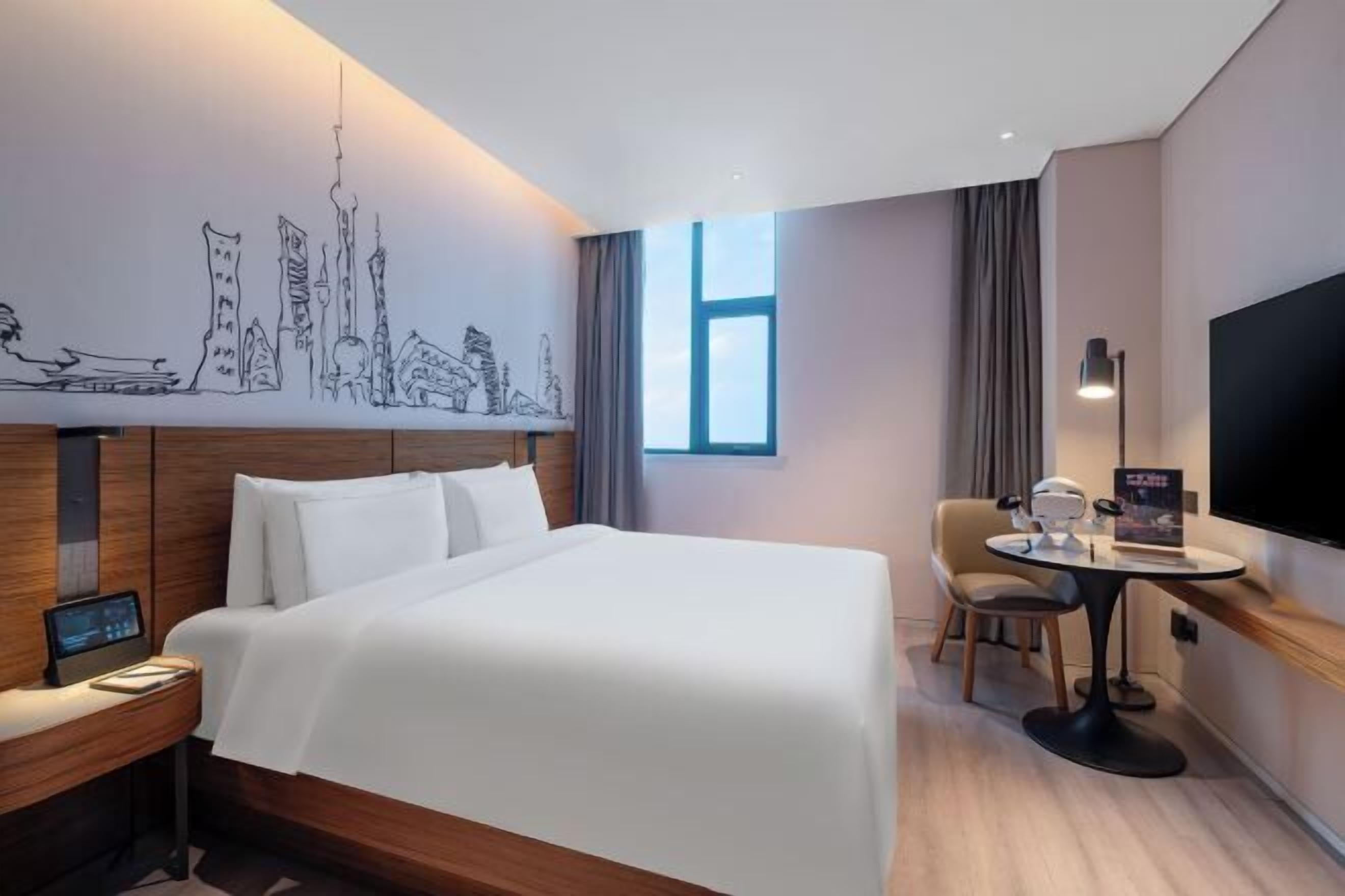 Down comforters, free minibar, in-room safe, desk