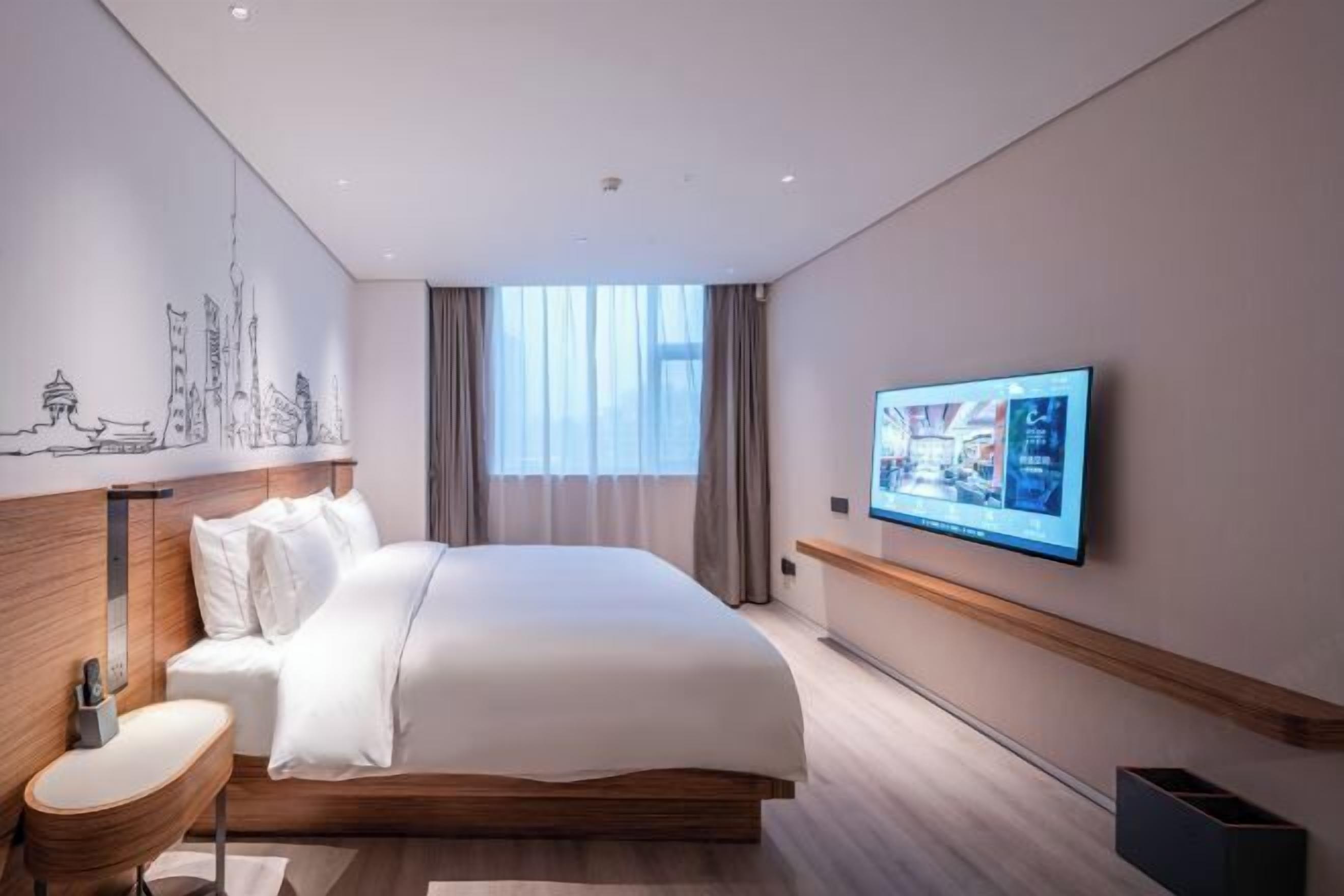 Down comforters, free minibar, in-room safe, desk