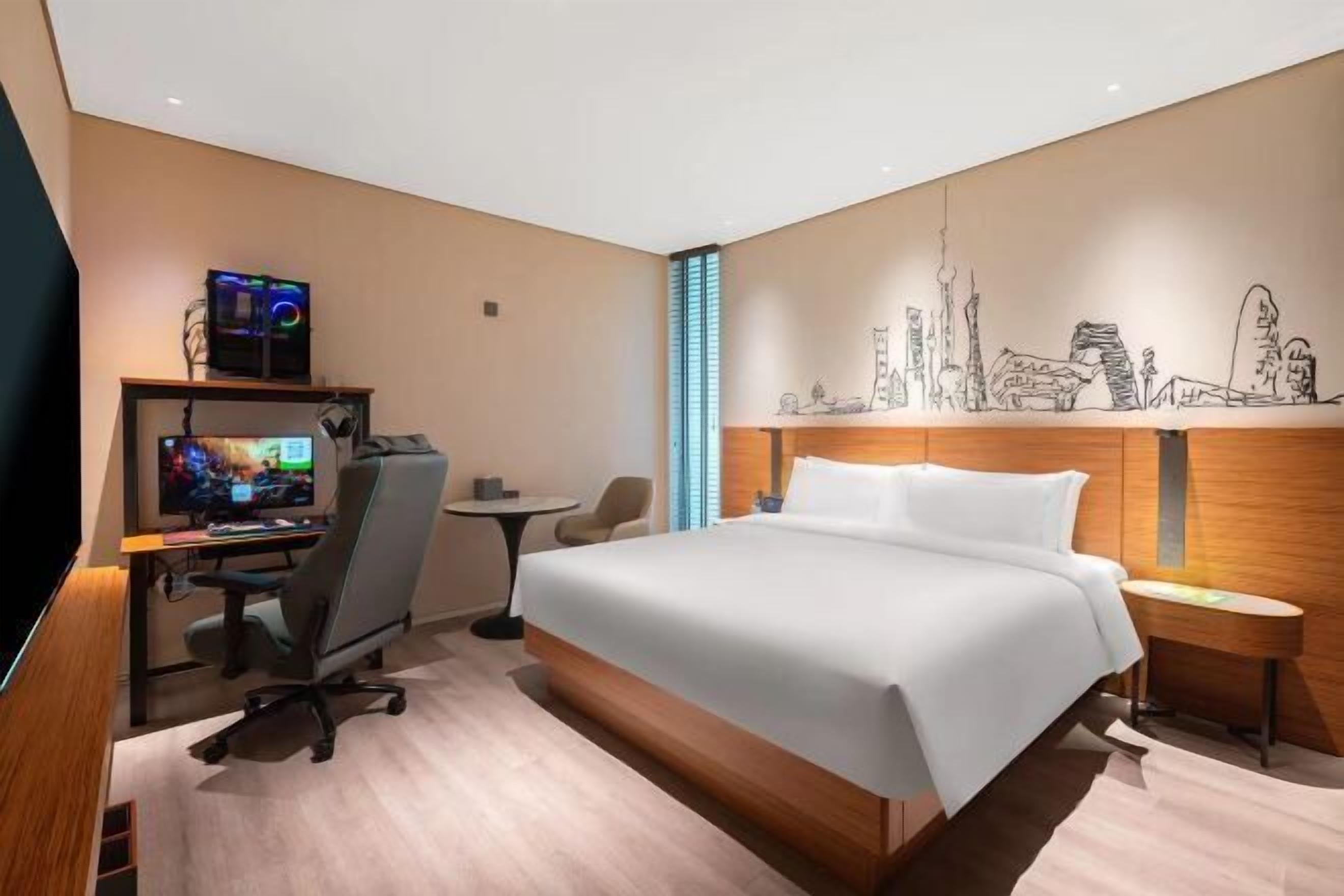 Down comforters, free minibar, in-room safe, desk
