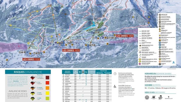 Mappa di una località sciistica con piste da sci indicate, impianti di risalita e cime montuose.