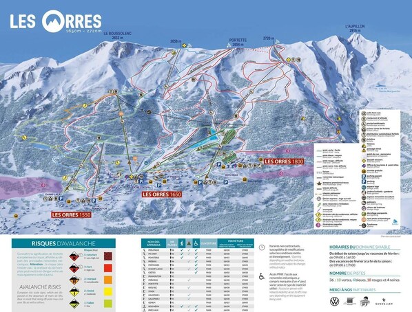 A ski resort map with marked ski trails, lifts, and mountain peaks.