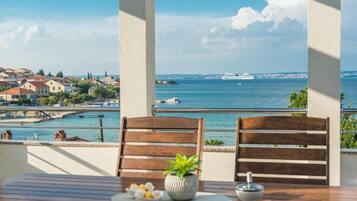 Apartment, 3 Bedrooms, Balcony, Garden View | Outdoor dining