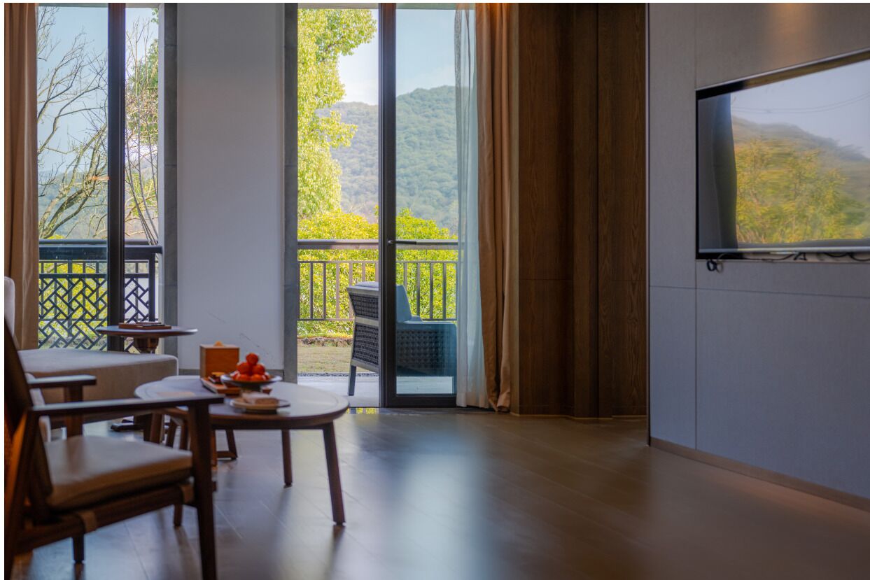 Premium Suite, 1 Bedroom | Living area | 55-inch Smart TV with cable channels