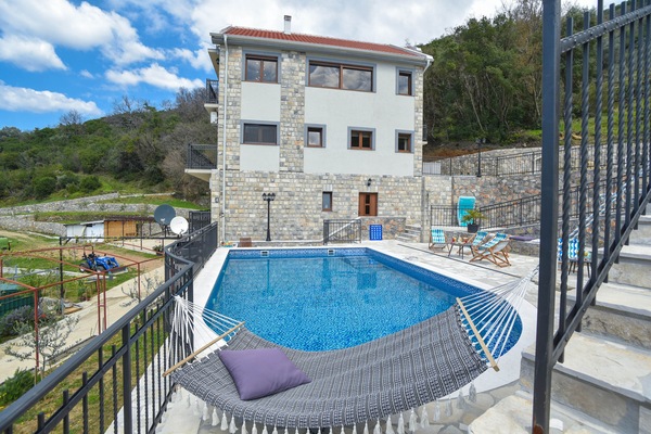 Privet pool with sun loungers