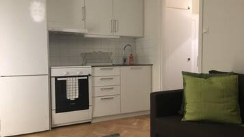 Apartment, 1 Queen Bed | Private kitchen | Fridge, microwave, oven, stovetop