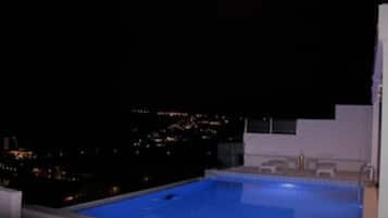 Enjoy a refreshing swim under the stars at our rooftop pool.