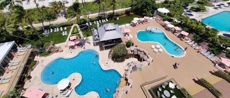 A heated pool, pool umbrellas