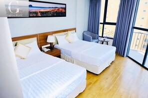 Deluxe Quadruple Room | Premium bedding, pillowtop beds, desk, free WiFi