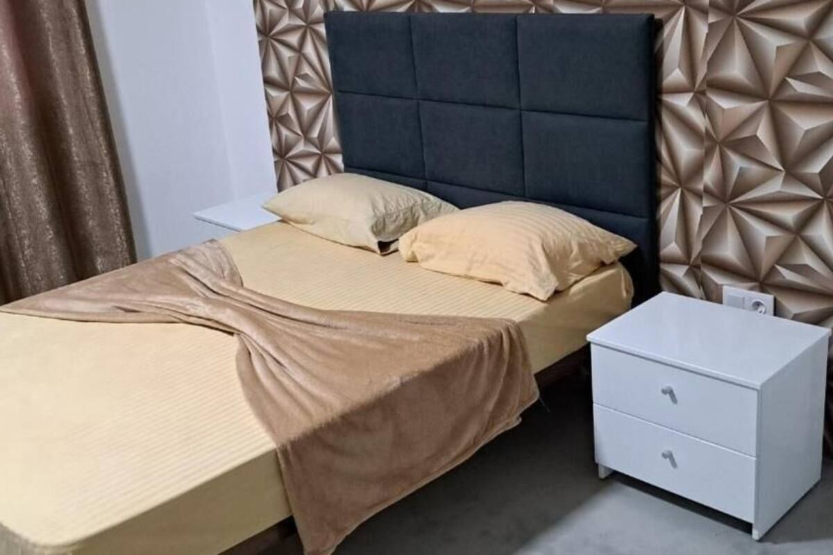 Appartement Classique | Coffres-forts dans les chambres, fer et planche à repasser