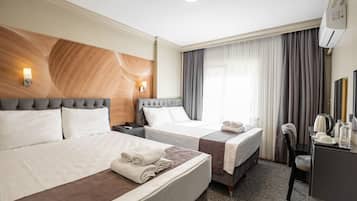 Egyptian cotton sheets, premium bedding, minibar, desk