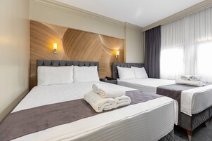 Egyptian cotton sheets, premium bedding, minibar, desk