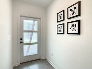 Bright Entryway with Playful Mickey Mouse Wall Art