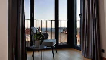 Deluxe Apartment, 2 Bedrooms, Non Smoking, Sea View | Living area | 43-inch Smart TV with satellite channels, TV, heated floors