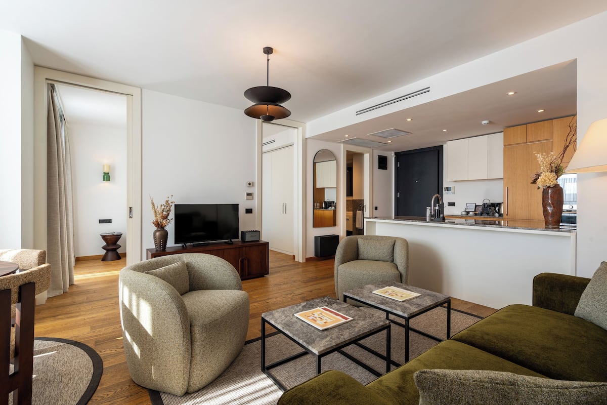 Superior Apartment | Living area | 43-inch Smart TV with satellite channels, TV, heated floors