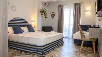 Superior Triple Room | Beach/ocean view