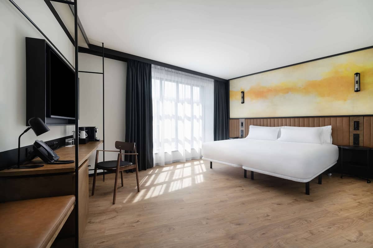 Junior Suite | 1 bilik tidur, peralatan tempat tidur premium, bar mini