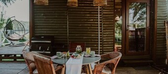 Holiday home with a terrace, right by the lake