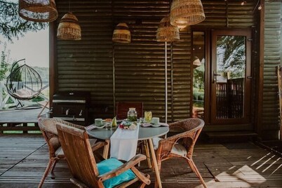 Holiday home with a terrace, right by the lake