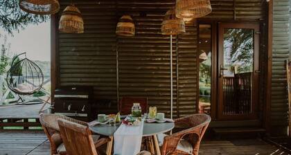 Holiday home with a terrace, right by the lake