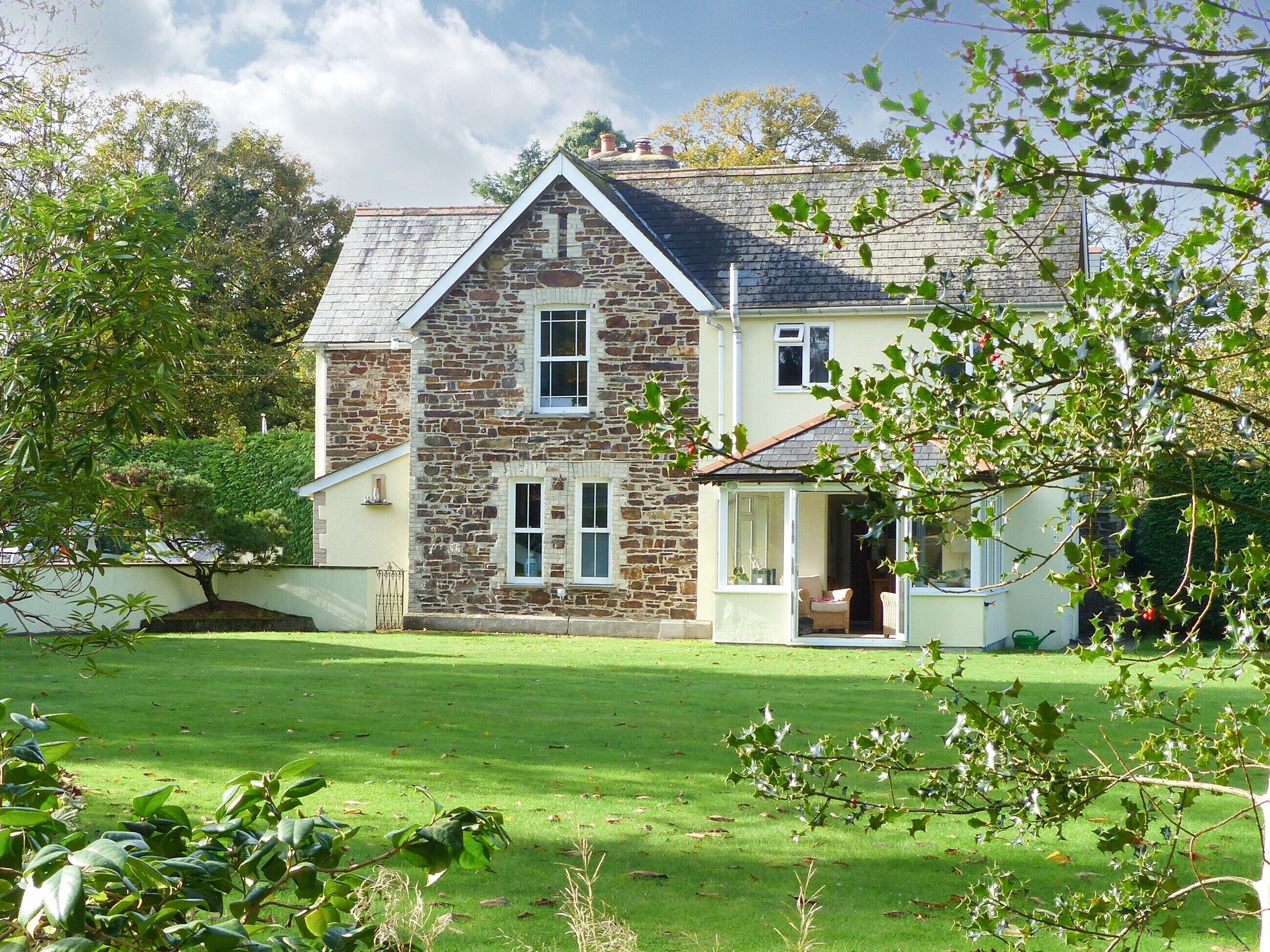 A rural retreat in a woodlands with large gardens.