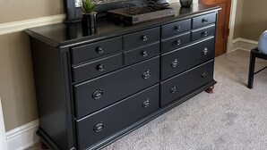 A black dresser with multiple drawers and a large mirror above it. - Quiet secluded home~ minutes from Ocean City boardwalk and beaches (Egg Harbor Township)