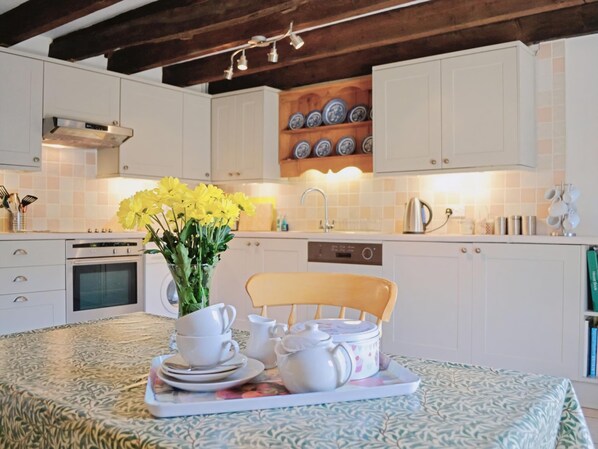 Dishwasher, highchair, cookware/dishes/utensils