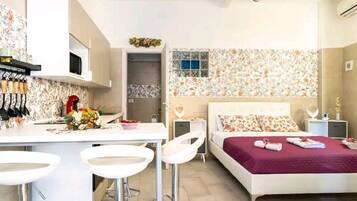 1 chambre, fer et planche à repasser, Wi-Fi gratuit, draps fournis
