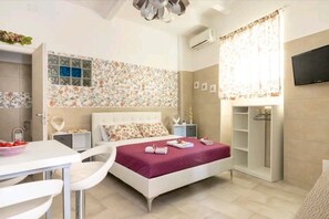 1 dormitori, planxa i posts de planxar, wifi gratuïta i roba de llit 