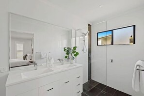 Bathtub, towels, shampoo
