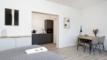 Deluxe Studio | Premium bedding, down comforters, pillowtop beds, individually decorated