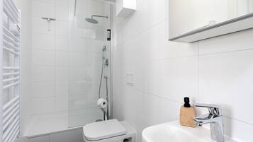 Shower, rainfall showerhead, hair dryer, towels