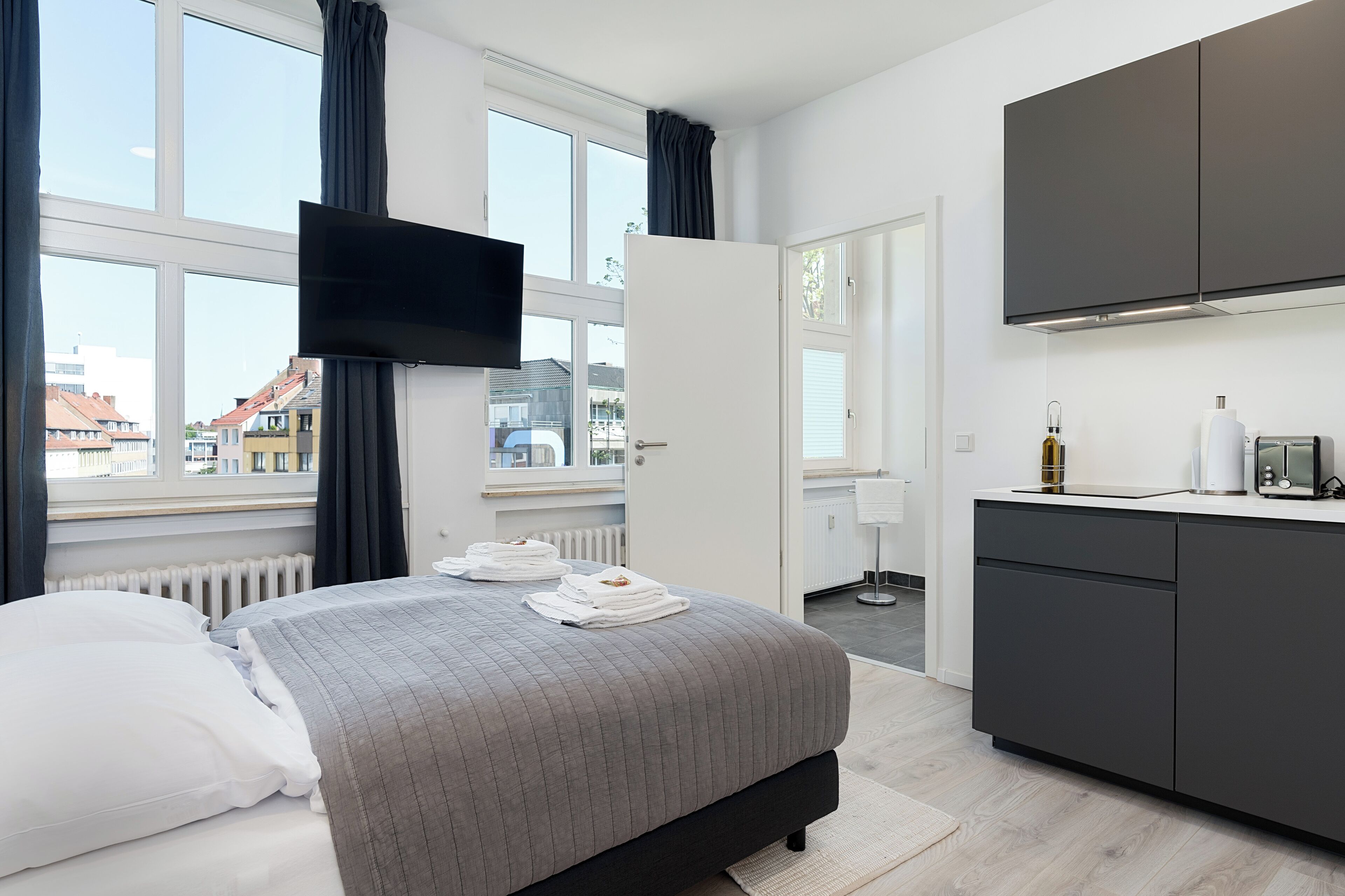 Comfort Studio | Premium bedding, down comforters, pillowtop beds, individually decorated