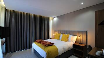 In-room safe, desk, laptop workspace, blackout curtains