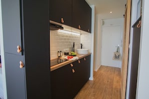 Fridge, microwave, dishwasher, coffee/tea maker