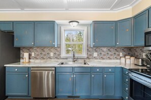 Fridge, microwave, oven, stovetop - Waterfront Cottage with Covered Boat Slip (Alanson)