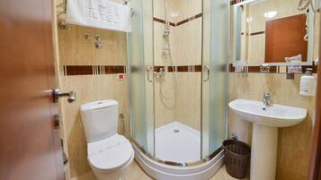 Shower, free toiletries, hair dryer, slippers