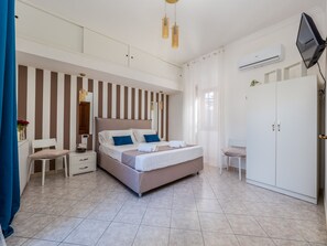 Apartamento junior | 1 dormitorio, tabla de planchar con plancha, wifi gratis y ropa de cama