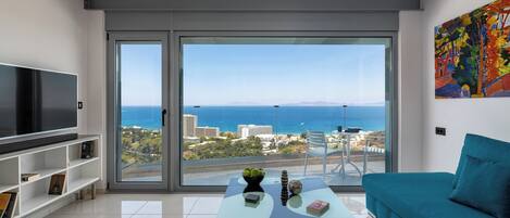 Appartement, 1 chambre, fumeur, balcon | Salle de séjour | Livres