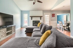 Smart TV, fireplace, books