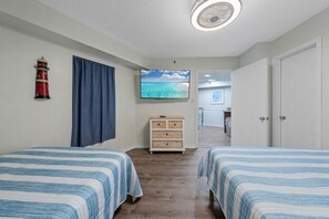 2 habitaciones, tabla de planchar con plancha y ropa de cama