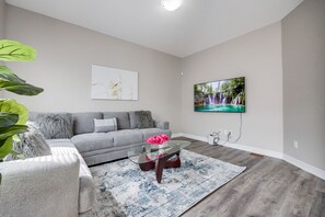 Family House | Living area - Aaira Suites 4 Bedroom (Brampton)