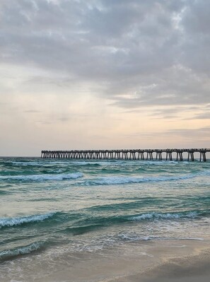 Navarre Beach is home to crystal clear emerald waters & sugary white sand!