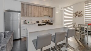 Unclassified image, 2 of 58, button - Aaira Suites 3 Bedroom Condo (Brampton)