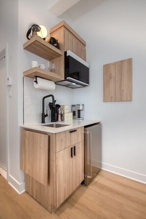 Microwave, stovetop, coffee/tea maker, toaster