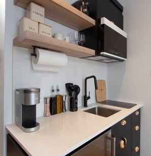 Microwave, stovetop, coffee/tea maker, toaster