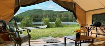 Glamping Retreat with private lake, 330+ acres and frontage on the Cedar River