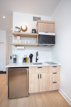 Microwave, stovetop, coffee/tea maker, toaster
