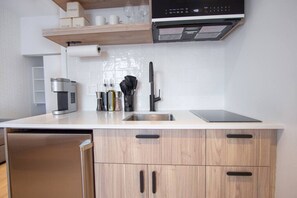Microwave, stovetop, coffee/tea maker, toaster