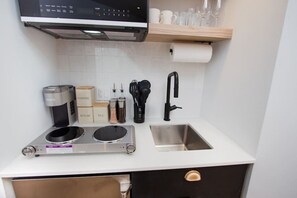 Microwave, stovetop, coffee/tea maker, toaster